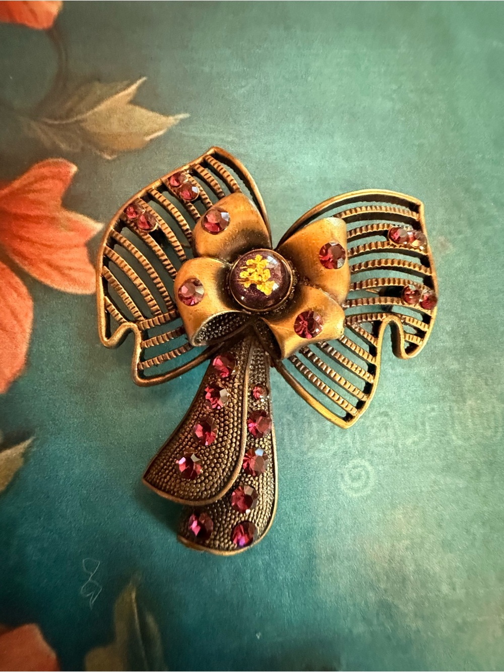 Antique Gold-Tone Bow Brooch with Pink Crystal Accents